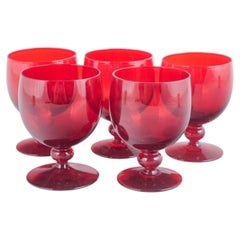 Monica Bratt for Reijmyre Glasbruk. Set of five ruby-red wine glasses, 1950s