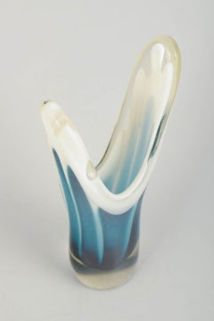 Paul Kedelv for Flygfors. "Coquille” vase in white and blue art glass, 1955.