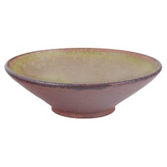 European Studio Potter. Stoneware bowl with green and brown glaze. 1960/70s