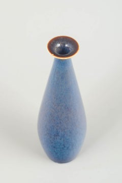 Carl-Harry Stålhane for Rörstrand. Slim ceramic vase with blue glaze. Mid-20th C