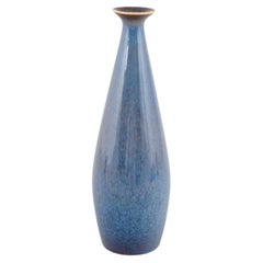 Carl-Harry Stålhane for Rörstrand. Slim ceramic vase with blue glaze. Mid-20th C