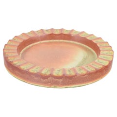 Höganäs, Sweden. Low ceramic dish with relief rim. Art Deco style, 1940s