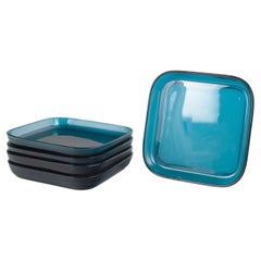 Kaj Frank. Juego de cinco platos de cristal artístico en tonos azul verdosos. Mediados del siglo XX
