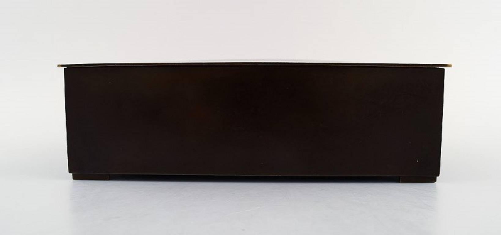 Rare Just Andersen Art Deco box or jewelry box in bronze.

Marked. B 1909.

In good condition, beautiful patina.

Measures: 20 x 14 x 6 cm.