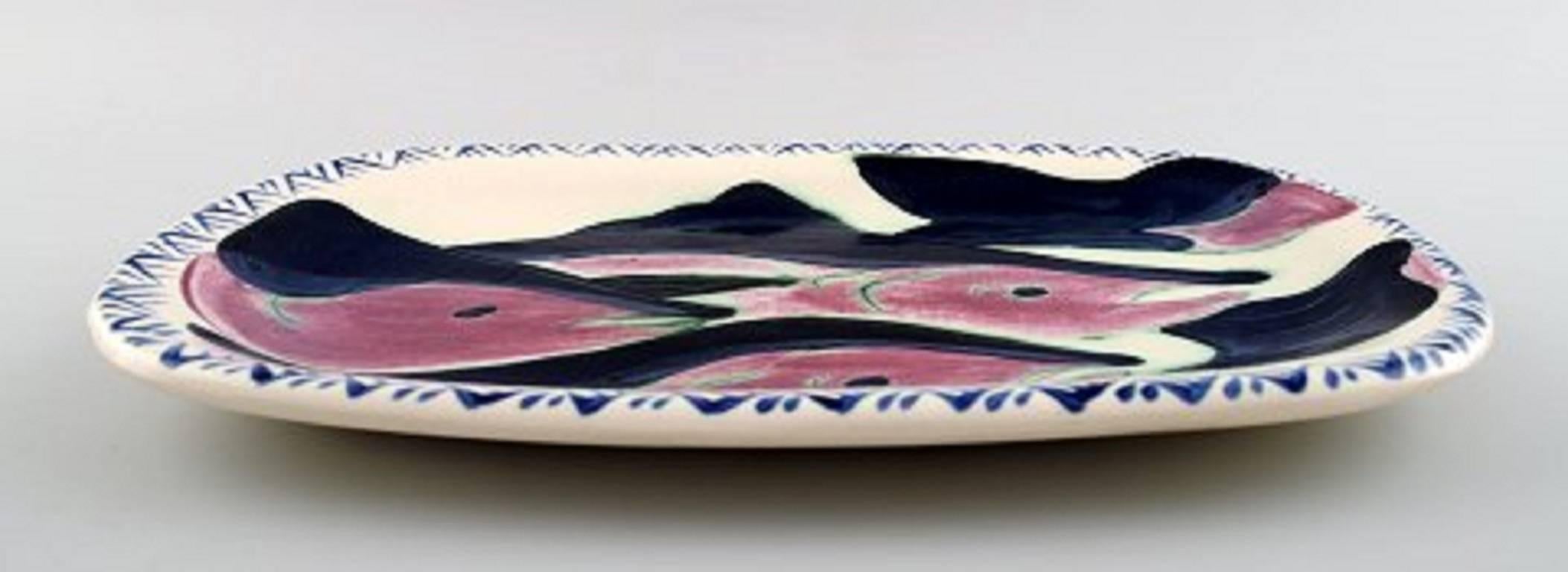 Kate Maury unique ceramic dish decorated with fish.

Stamped: Maury 2001, Alaska.

Measures: 28.5 cm. X 22 cm.

In perfect condition.