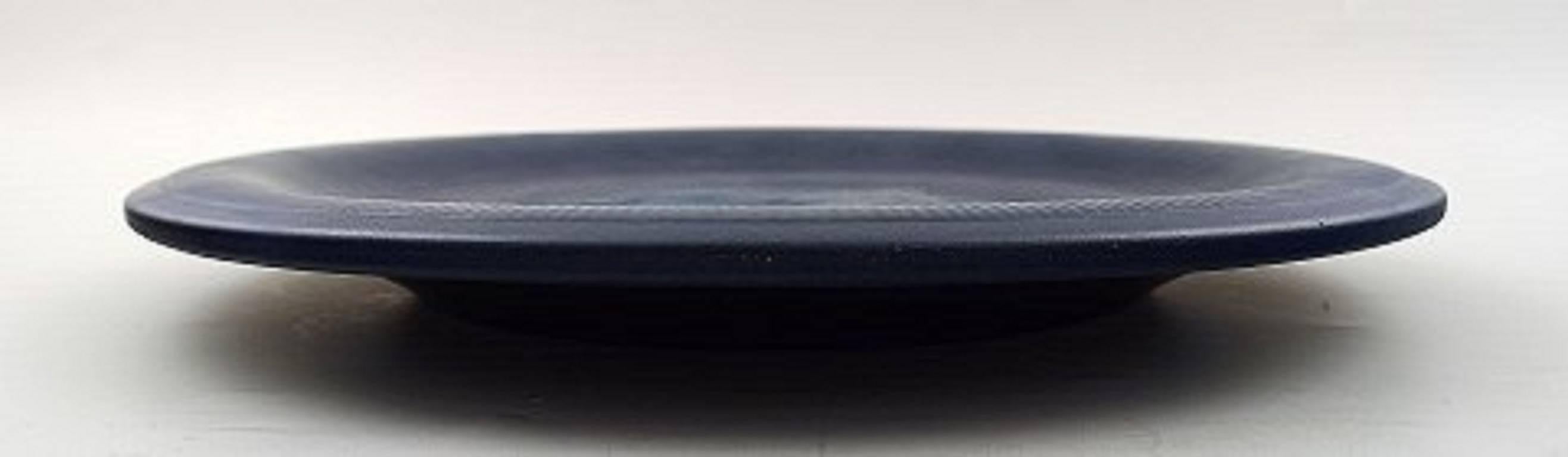 Ipsens, copenhagen, number two, ceramic dish, fish in relief
Beautiful dark blue glaze.
Measures: 30 cm.
In perfect condition.
Stamped.