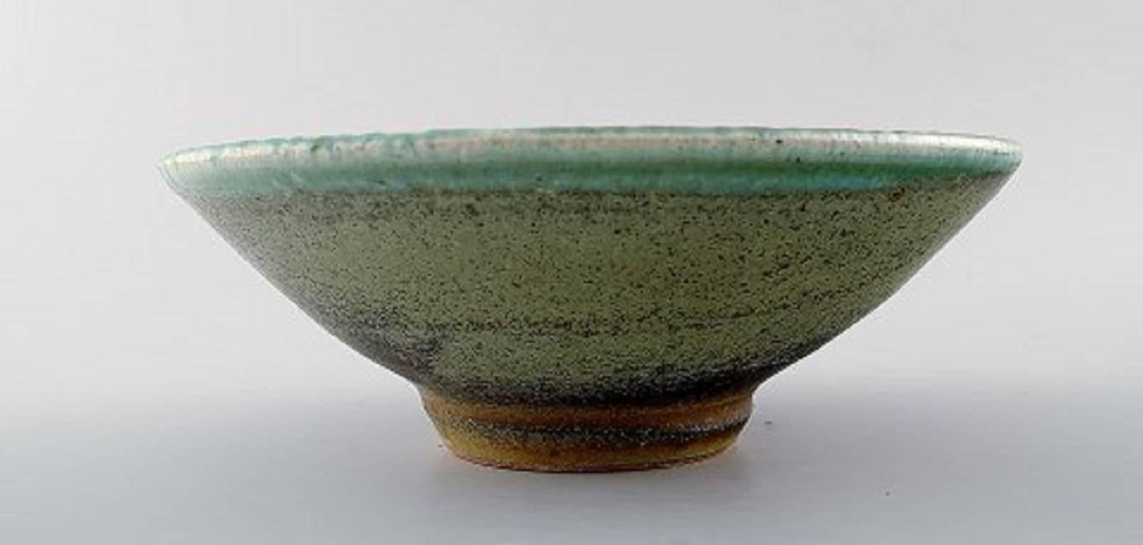 Danish ceramist.
Handmade, unique ceramic bowl.
Signed illegible.
Measures: 20 cm. x 8 cm.
In perfect condition.