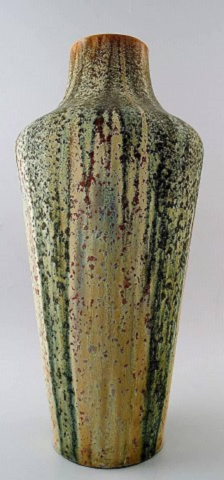 Jean Langlade (1879-1928) French ceramist.
Large floor vase, early 1900s.
Beautiful glaze in many shades.
Stamped.
In perfect condition.
Measures 49 cm. x 22 cm.