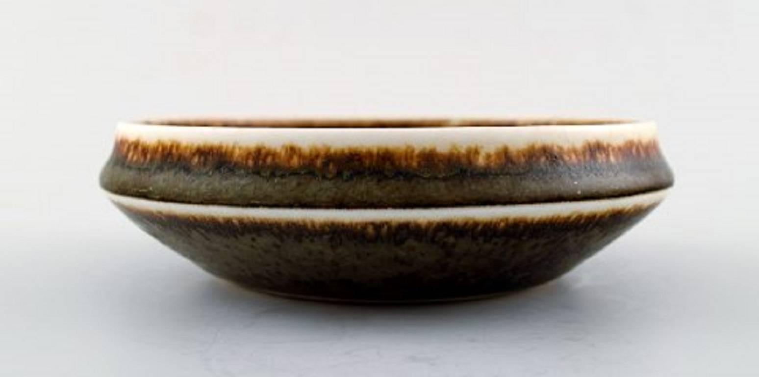 Carl-Harry Stålhane, Rørstrand, pottery dish.
Beautiful glaze in brown shades.
Measures: 14 x 4 cm.
In perfect condition, 1st. factory quality.