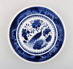 Peacock from Copenhagen Faience or Aluminia, Deep Plate in Faience, Four Pieces