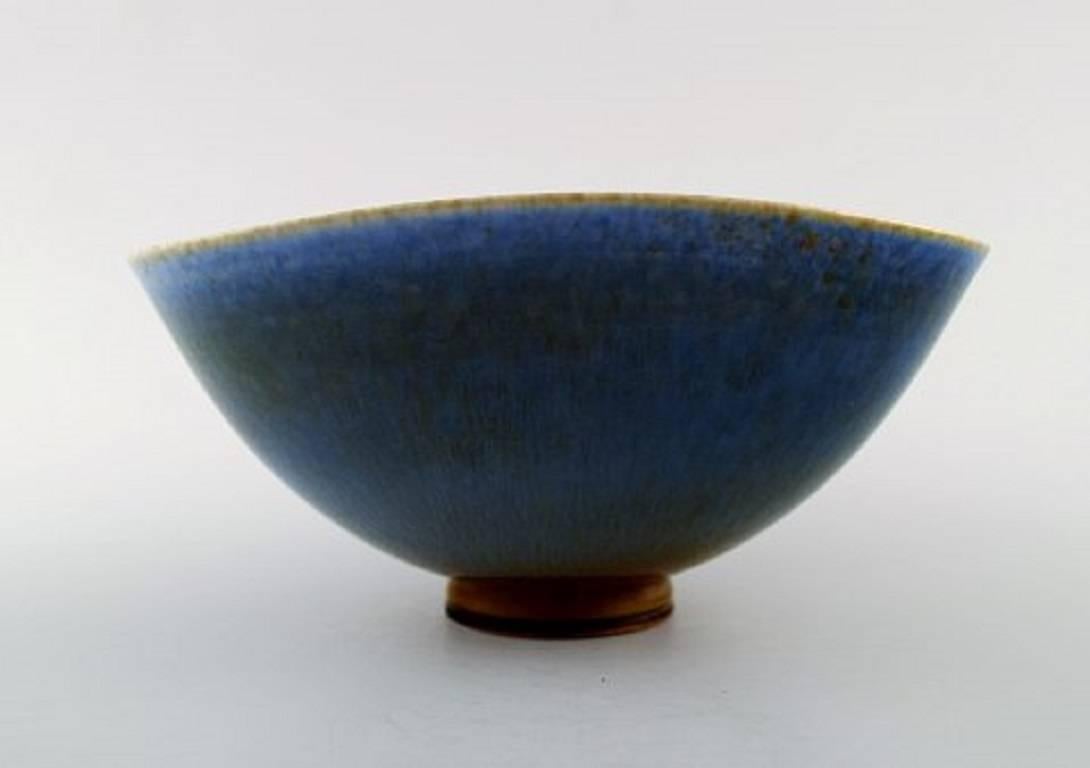 Berndt Friberg Studio ceramic bowl. Modern Swedish design.
Unique, handmade. Fantastic glaze in blue and brown shades!
Perfect. 1st. factory quality. 
Signed.
Measures: 15.5 cm. X 7 cm.