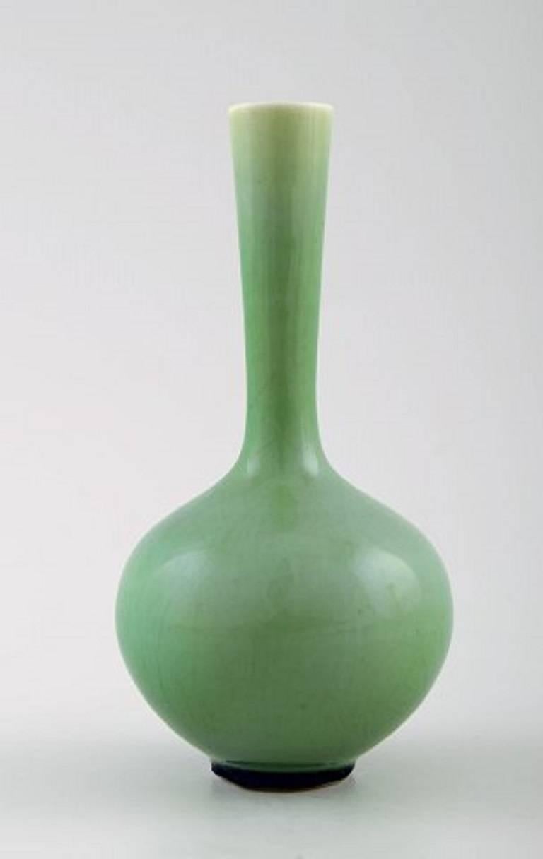 Friberg studiohand ceramic vase, unique.
Fantastic glaze in green shades.
Marked, 1960s.
Perfect. 1st.
Measures: 9.5 cm. x 5 cm.