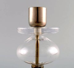 Erik Höglund for Kosta Boda, Candlestick in Cast Iron with Handblown Glass