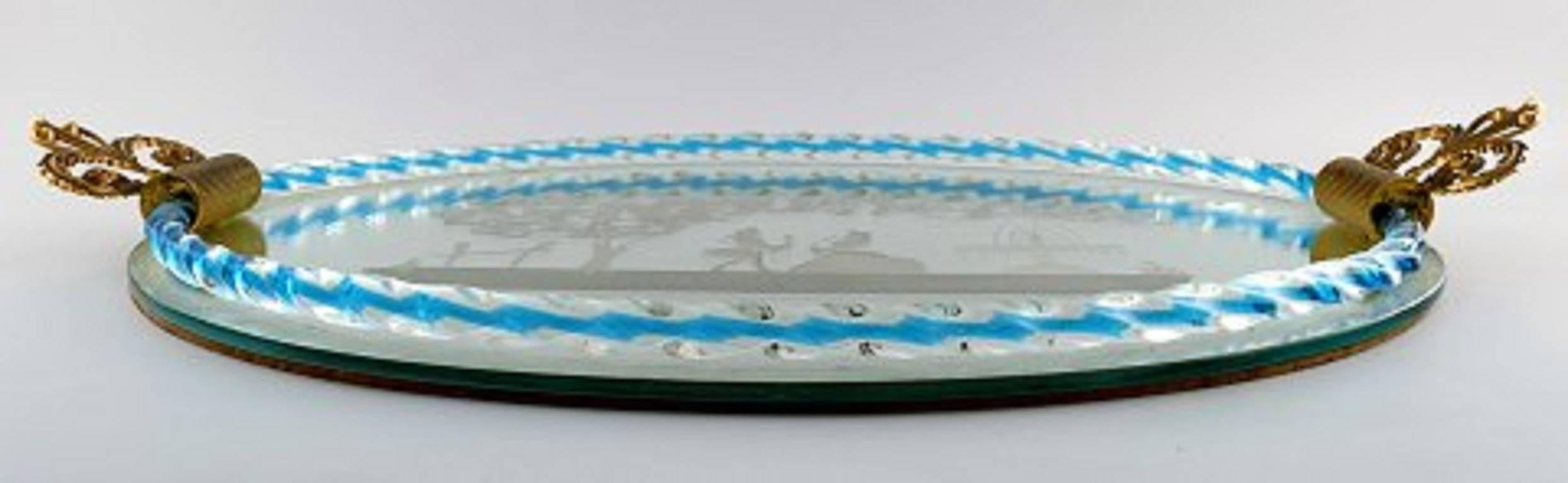 Murano, Italy, Art glass rectangular tray with mirror coating, with galant scene, two gold-colored metal grips on the side. 
Measures: Length approx. 57 cm (with handle), Width approx. 33 cm.
In perfect condition.
1960s.