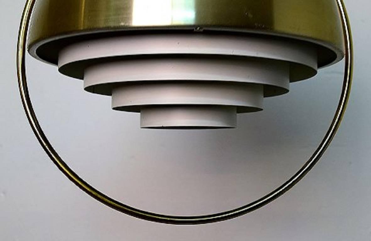 Scandinavian designer, brass ceiling lamp.
In good condition, wear.
Measures: 35 cm x 35 cm.