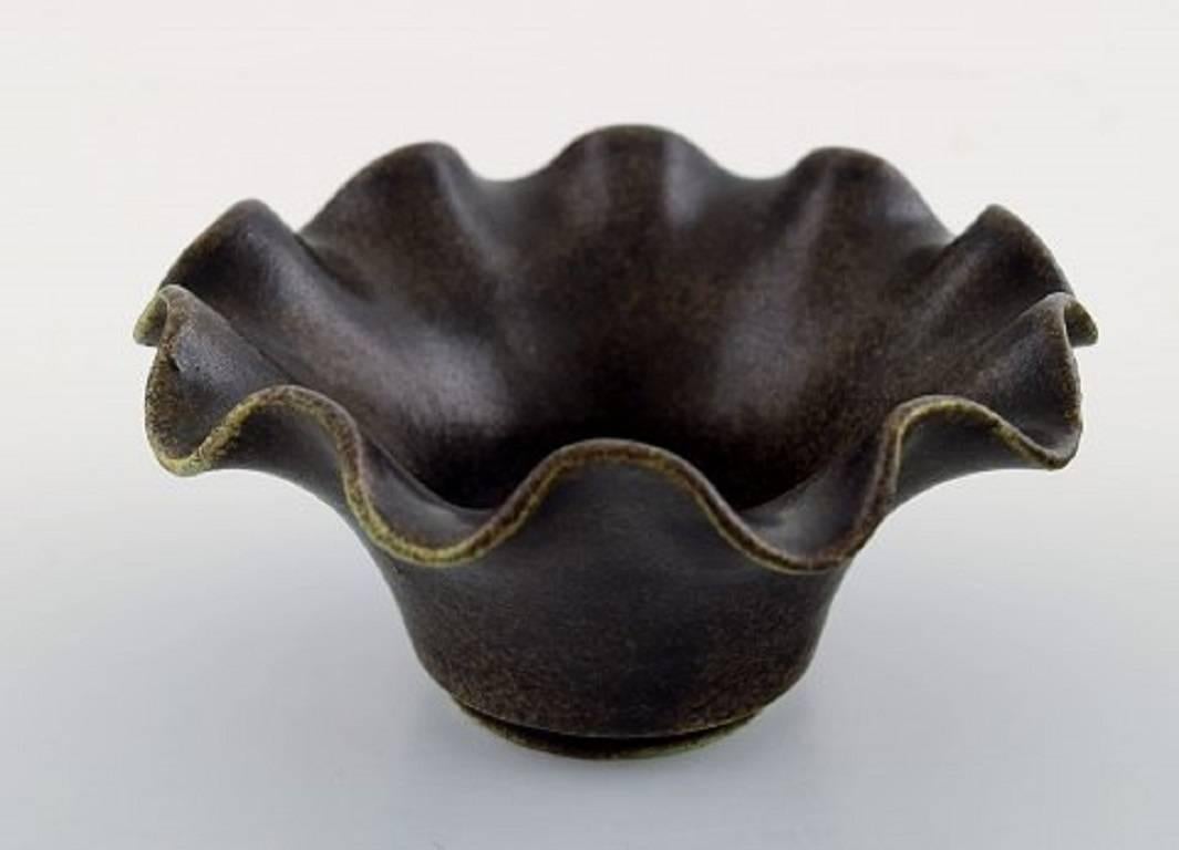 Arne Bang. Pottery Bowl. Denmark mid 20 c.
Marked AB 109.
Beautiful glaze in brown shades.
In perfect condition.
Measures 10.5 cm. x 5.5 cm.