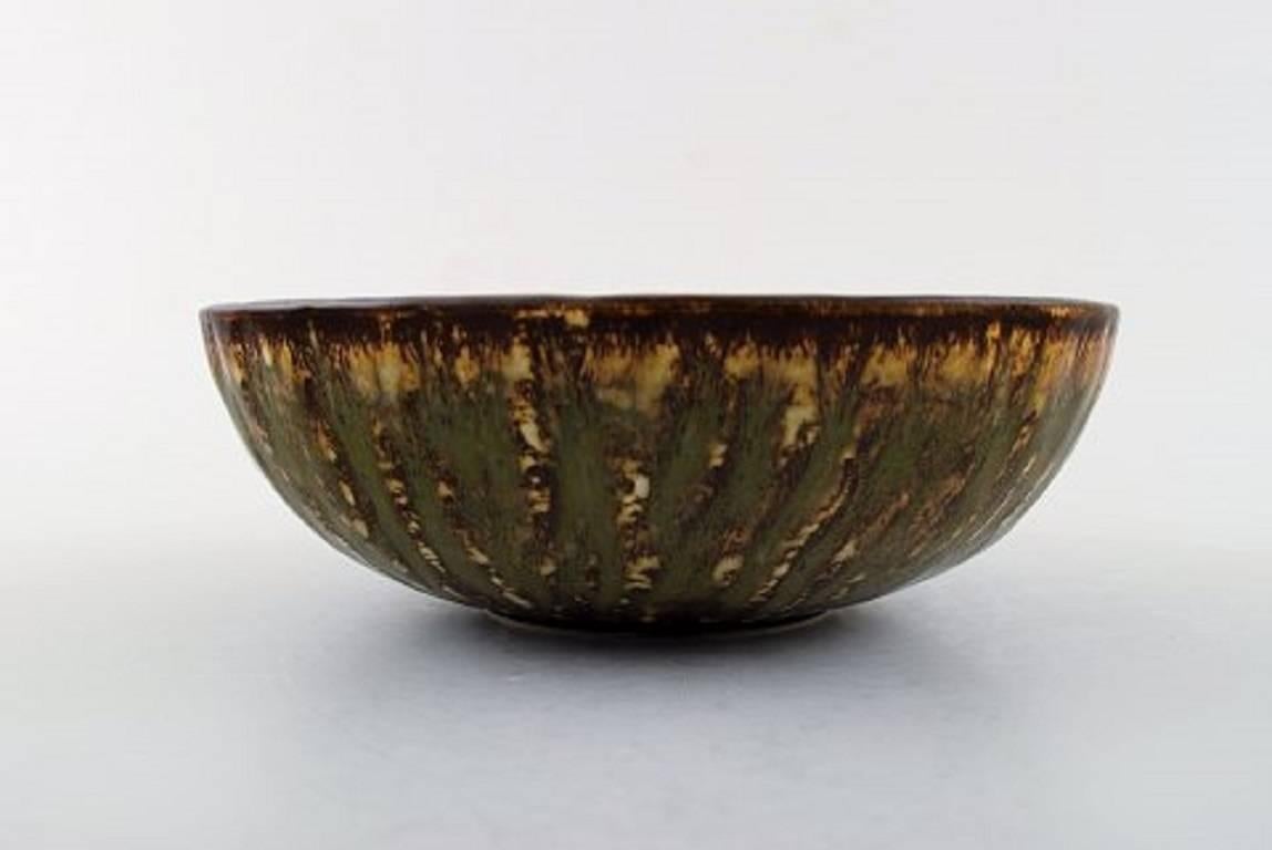 Gunnar Nylund for Rorstrand/Rørstrand.
Ceramic bowl, beautiful birch wood glaze.
Measures: 16.5 cm. x 6 cm.
2nd. factory quality. In perfect condition.