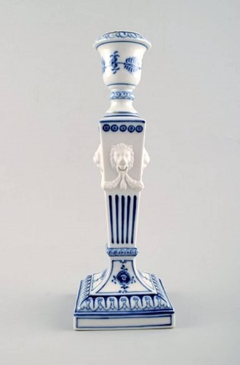 A pair of Royal Copenhagen blue fluted plain, candlesticks with lion heads.
1. factory Quality, in very good condition. 
No. 1/15.
Measures: Height 22.5 cm.