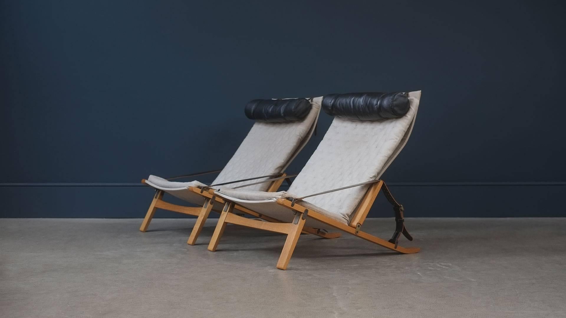 Ultra rare and exceptional PB10 folding lounge chairs in oak and leather with original pillows designed by Preben Fabricius and Jorgen Kastholm for master cabinetmaker Poul Bachmann 1963, Denmark. Amazing chairs and super comfortable.
 