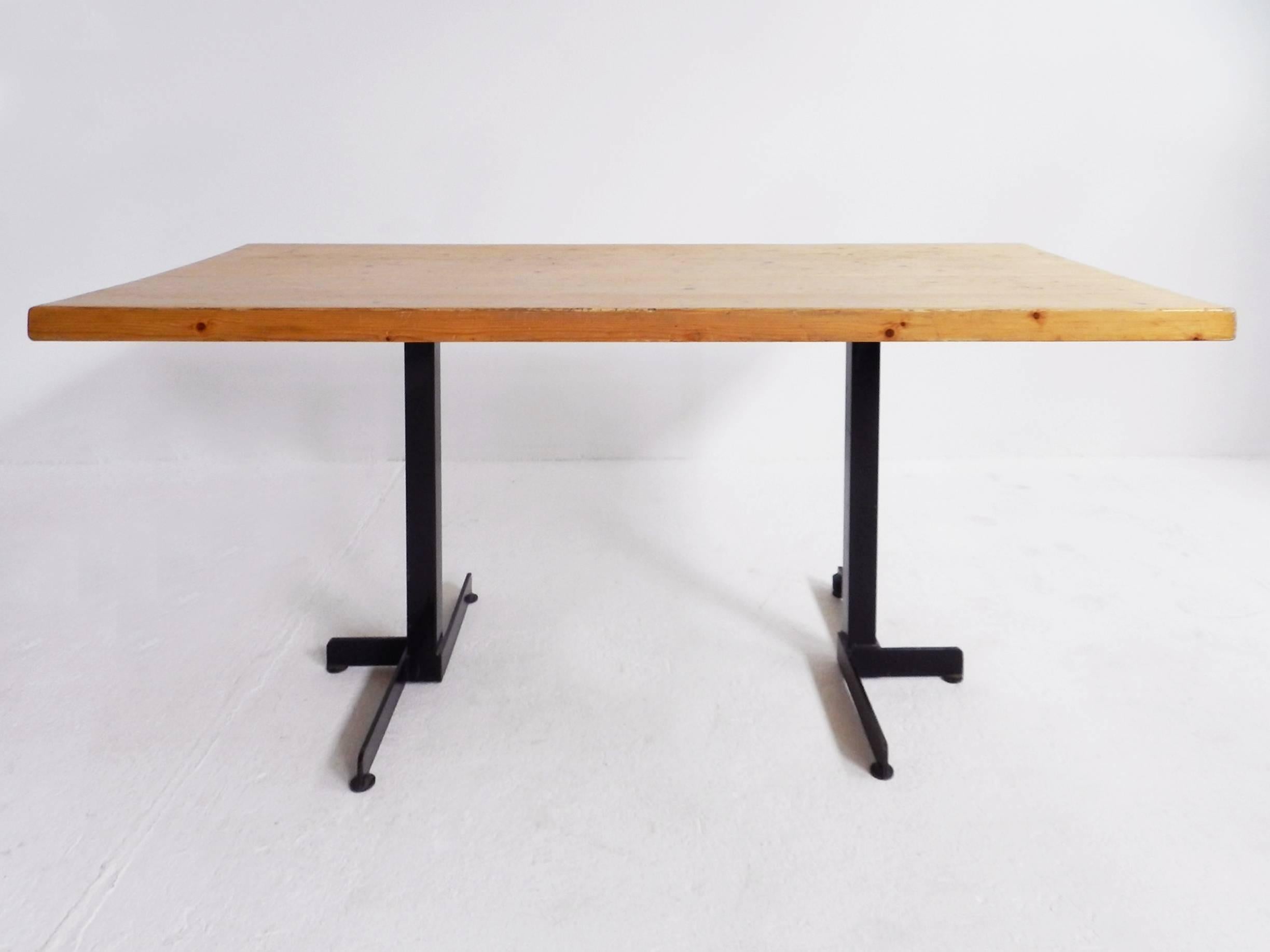 Iconic table designed by Charlotte Perriand for Les Arcs ski resort circa 1960, manufactured in France. 
It is made from beautiful pine wood and remains in original condition.