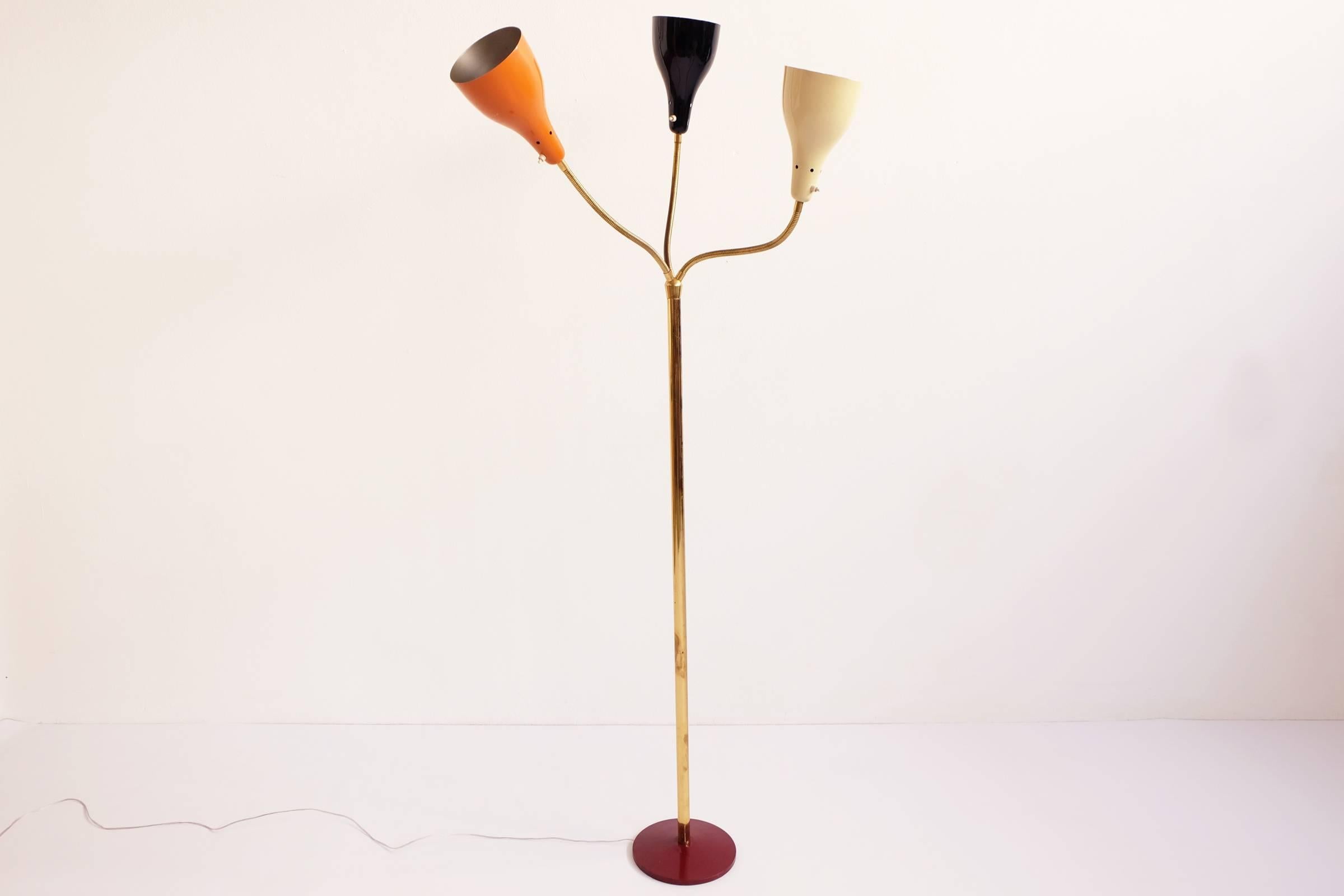 Totally original floor lamp by the Italian midcentury time, produced by O-Luce

Dimension
diameter of the base 25 cm
diameter of the shades 15 cm
Min height 142 cm
Max height 197 cm.