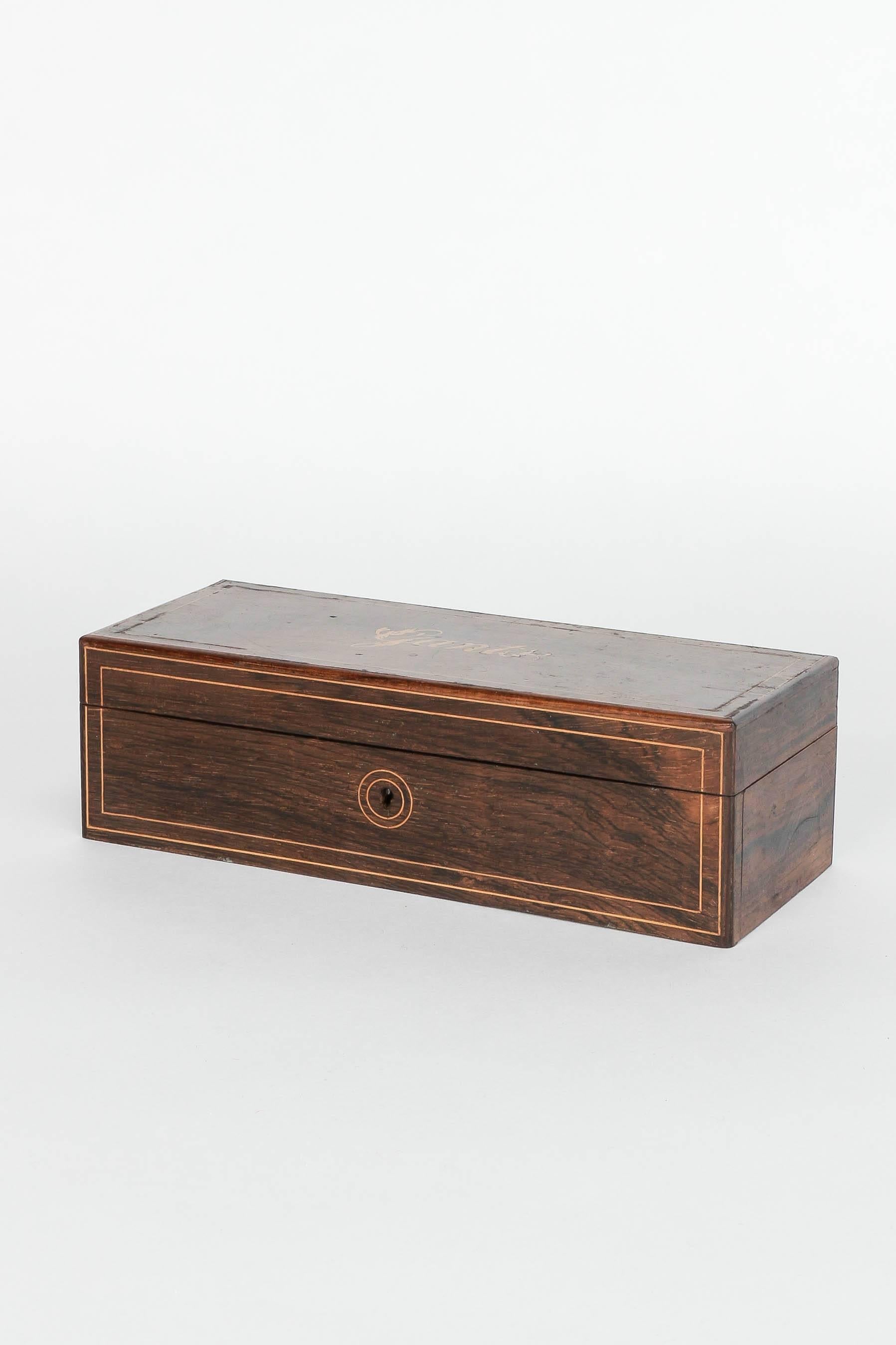 Incredible French glove box made of rosewood, interior is made of birds eye maple. Manufactured in France, circa 1870. Brass hinges and fine inlays made of lemon wood with the lettering 