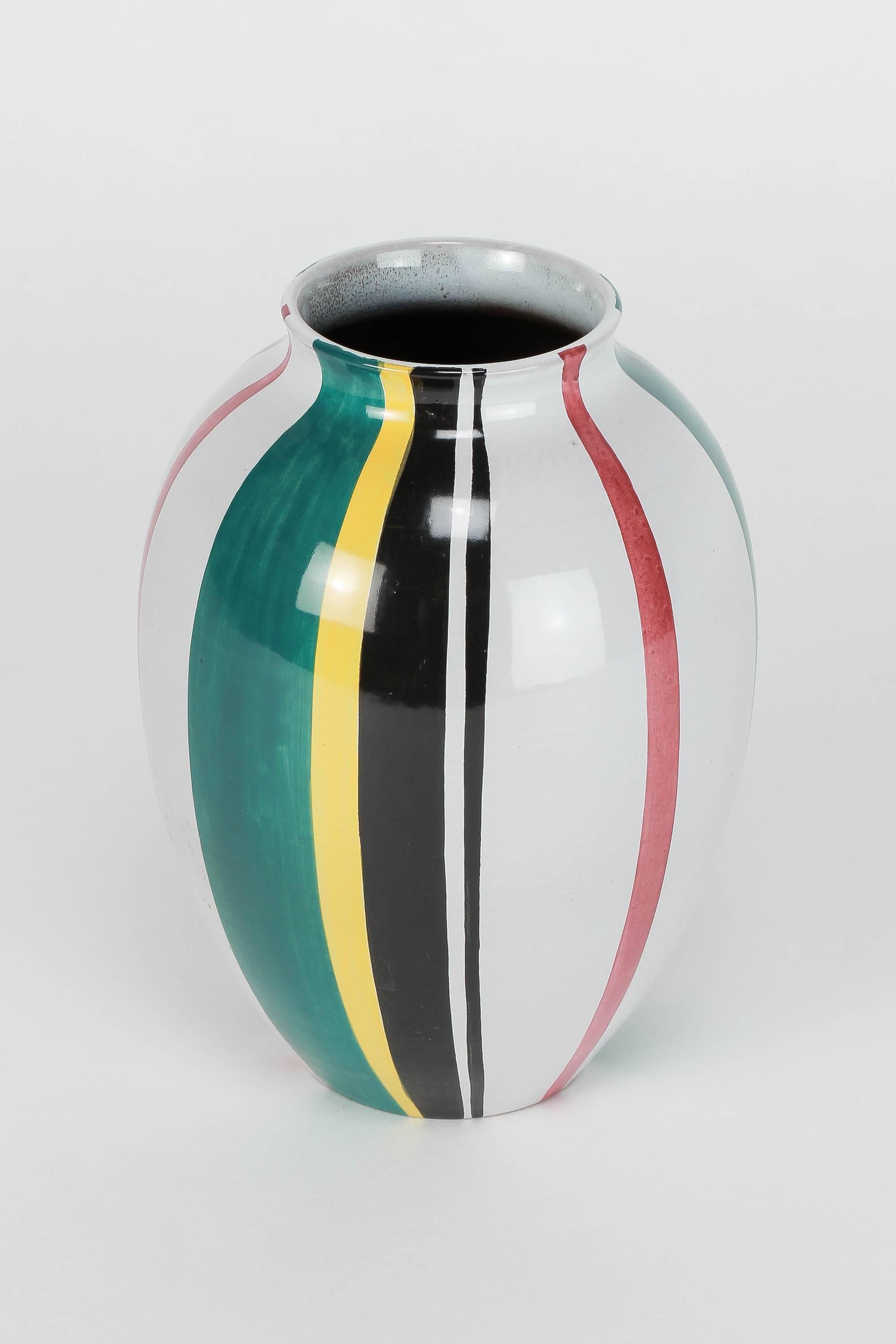 Wonderful Ziegler pottery vase by Gustav Spörri for Ziegler, manufactured in the 1950s in Switzerland. Gray toned undercoat with colorful stripes, hand signed to bottom with "Ziegler Handarbeit, 228" (handarbeit = handcrafted).
