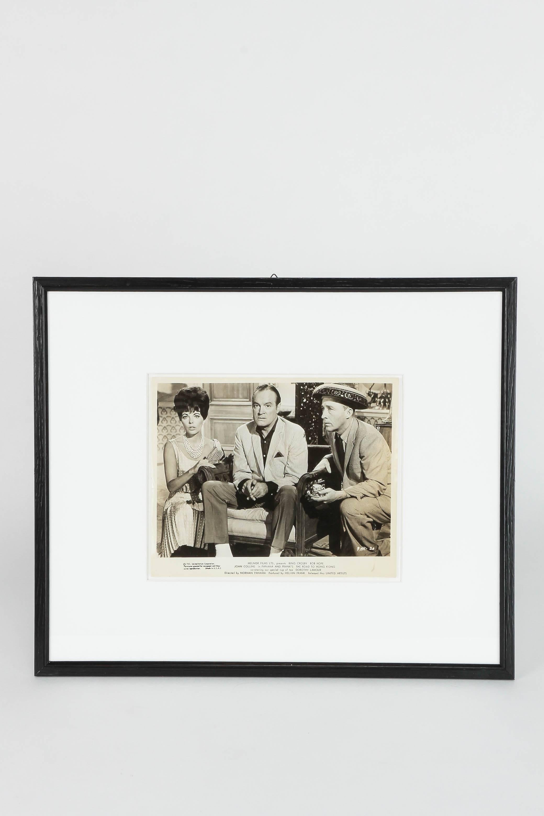 Original film photo by Paramount Pictures for the 1962 released movie The Road To Hong Kong. It shows the three main characters (f.l.t.r) Joan Collins as Diane, Bob Hope as Chester Babcock and Bing Crosby as Harry Turner. Frame is made of black