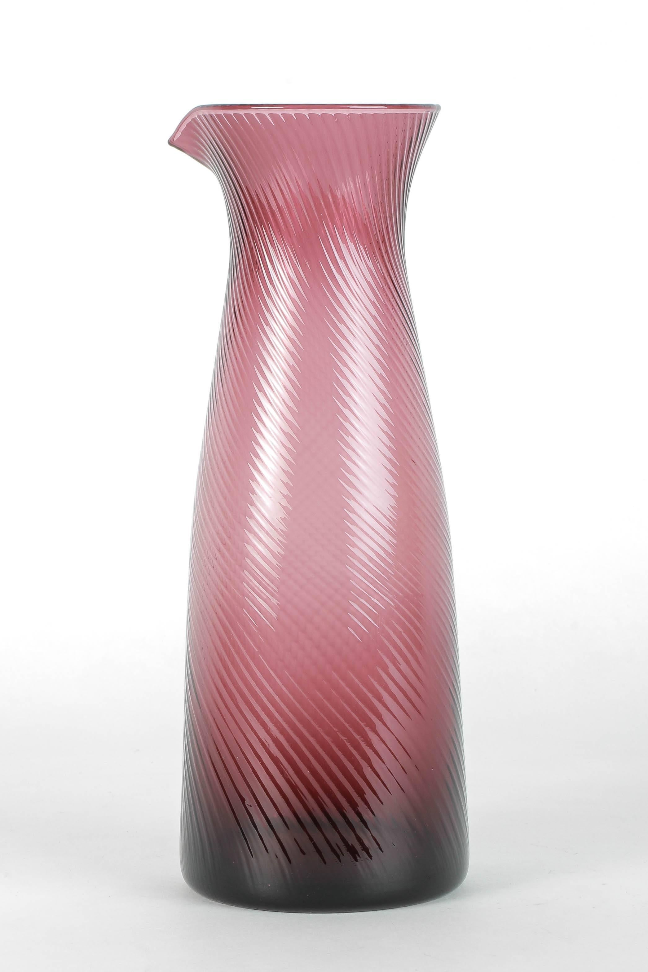 Wonderful Italian glass pitcher with a ribbed textured surface, stunning violet color manufactured in Venice in the 1950s.