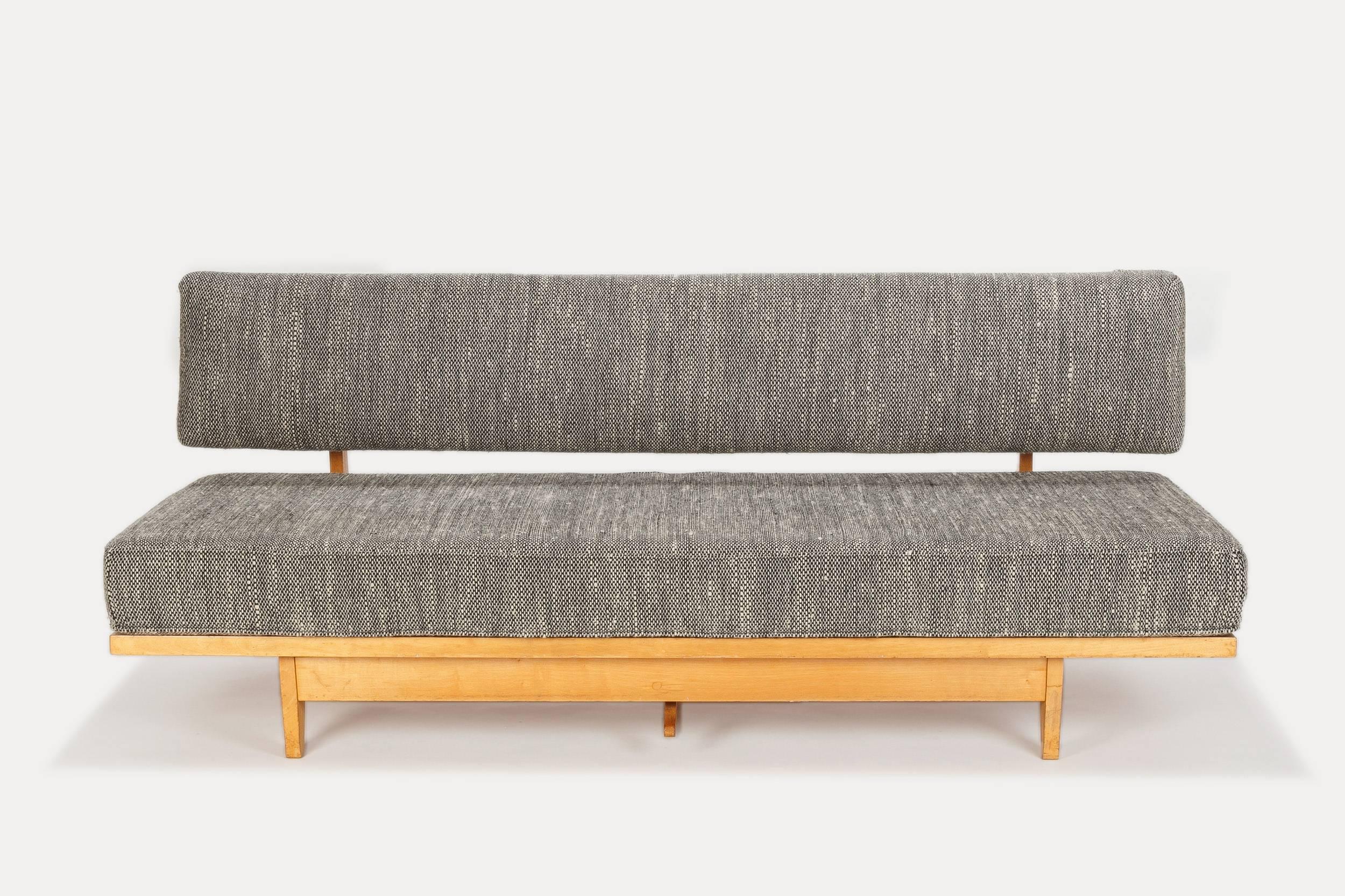 Richard Stein daybed model no 700 designed in 1947 for Knoll International. Frame is made of solid birch covered with the original woolen fabric. The back rest can be adjusted to use it as a guest or daybed. Was repaired on one corner on the back