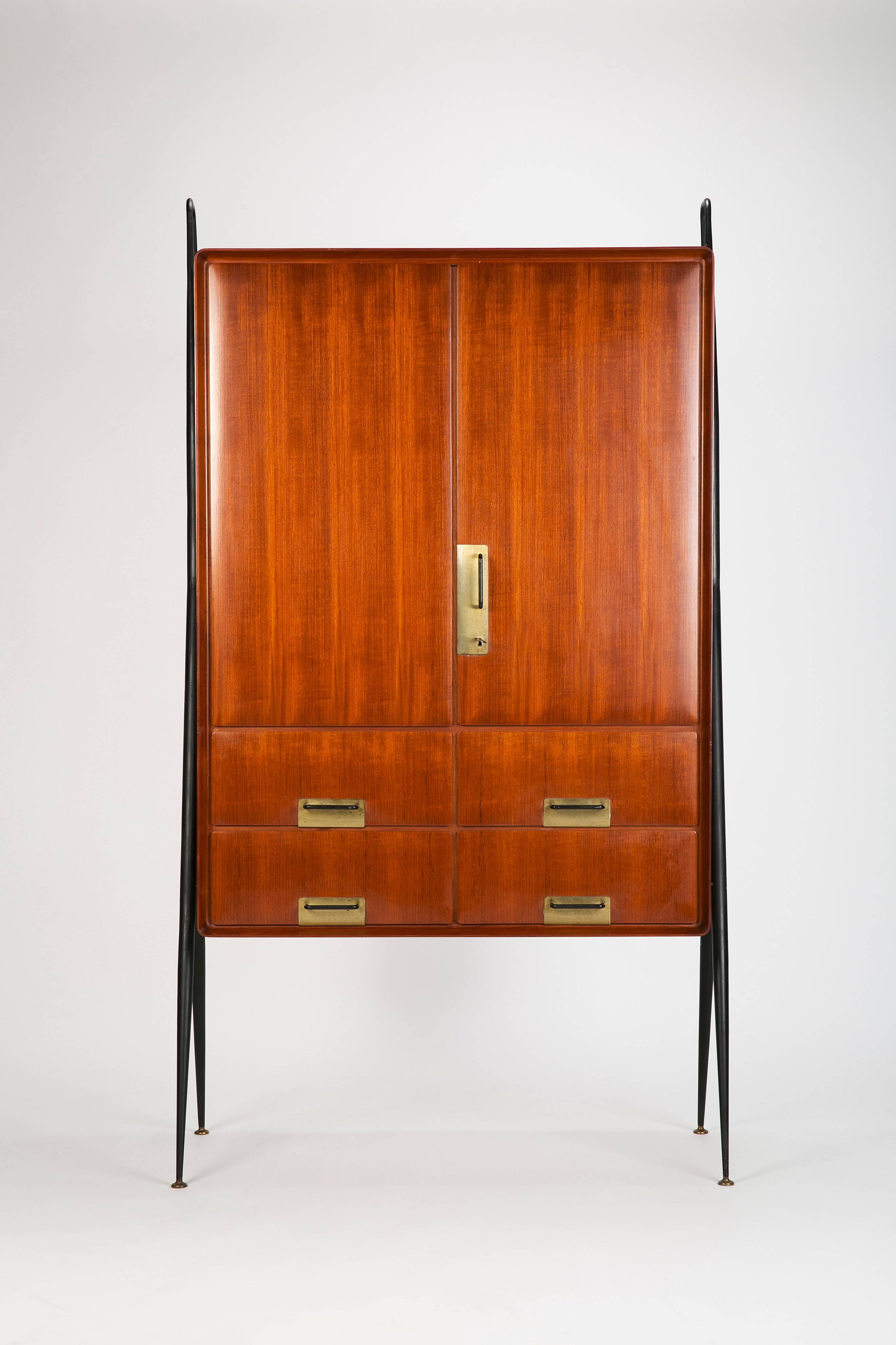 Stunning and rare highboard by Silvio Cavatorta, manufactured in Italy in the 1950s. High quality craftsmanship made of a lacquered steel tube frame with brass feet, body is made of a warm mahogany with an interior of birch. Wonderful brass details.