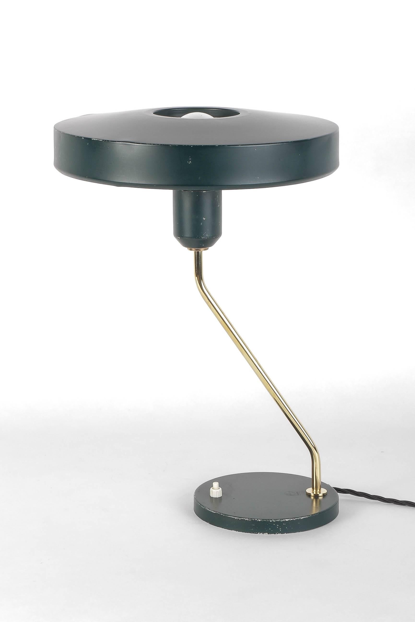 Louis Kalff table lamp model “Z” manufactured by Philips in the Netherlands in the late 1950s. Dark green original color with a fine brass stems and recently polished.