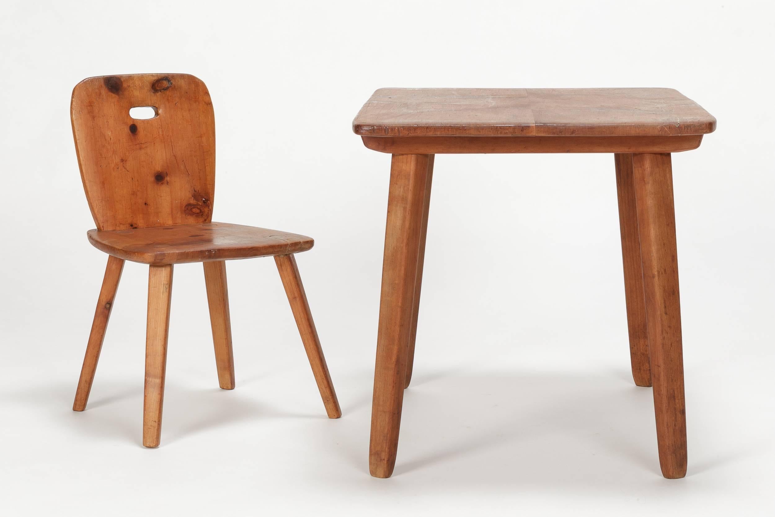 Swiss design by Jacob Müller. A children’s table with the matching chair made of ashwood, manufactured in his workshop in Zurich, Switzerland. This set was shown at the Swiss national exhibition in 1939 in Zurich (photo available on request). Solid