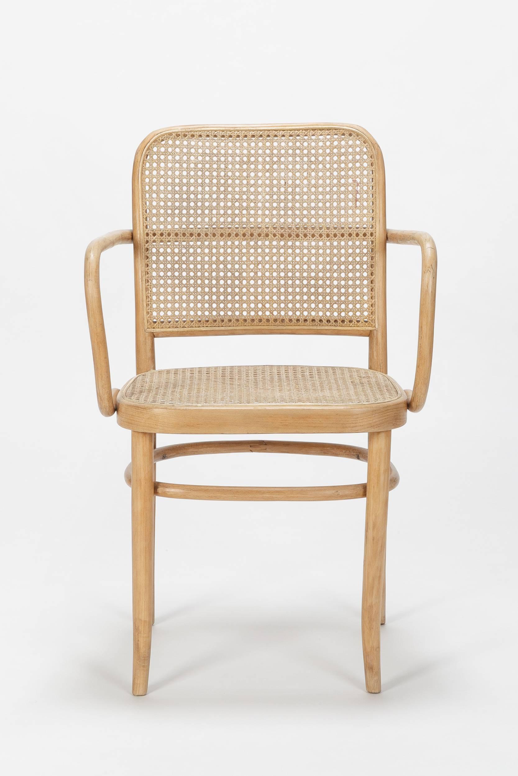An all original Prague chair by Josef Frank designed in the 1920s, it went in production with many different manufacturers, this model was manufactured in Italy by Salvatore Leone in the 1940s. Solid beech wood frame with the original cane webbing.