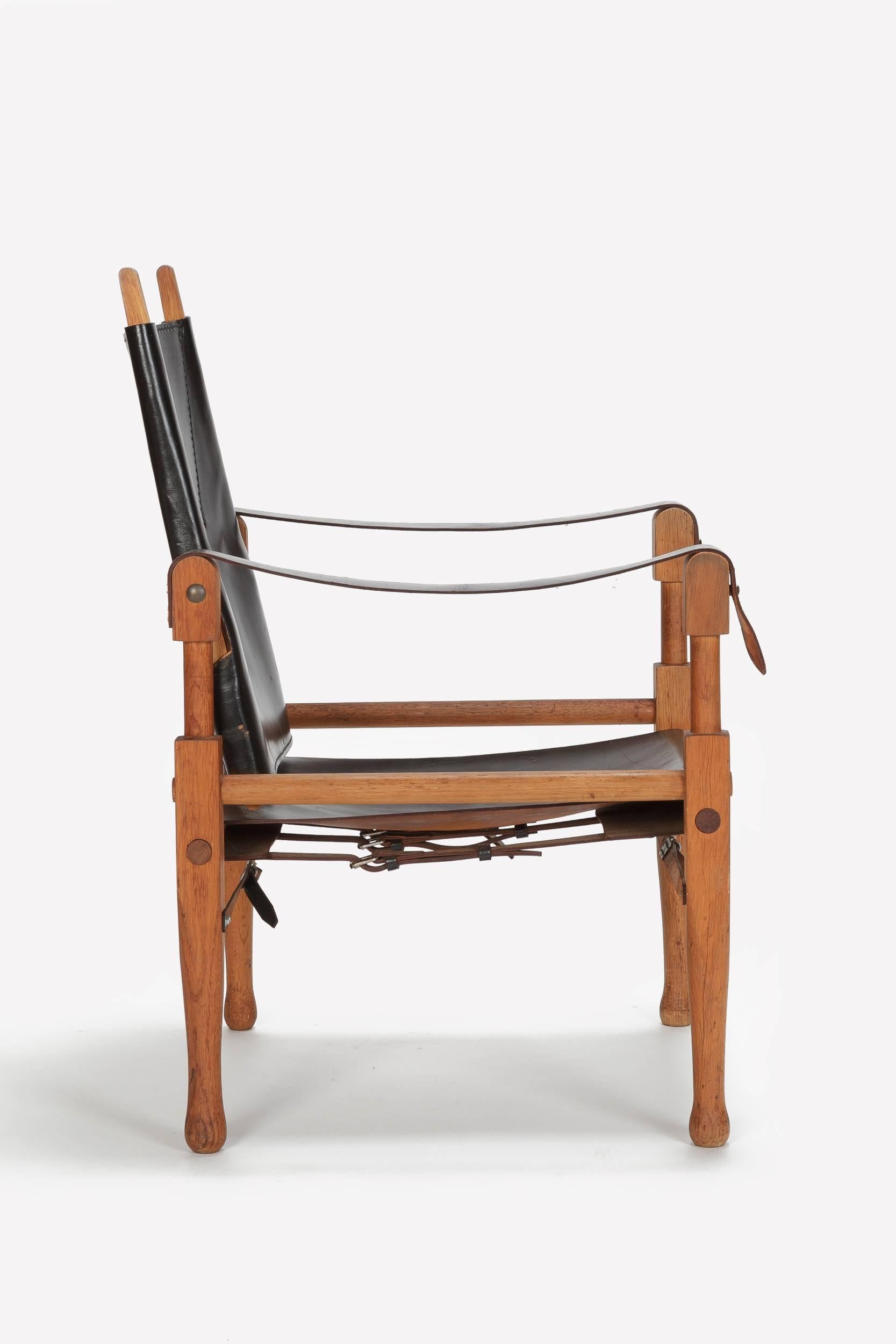 Mid-Century Modern Pair of Swiss Wilhelm Kienzle Leather and Oak Safari Chairs, 1950s