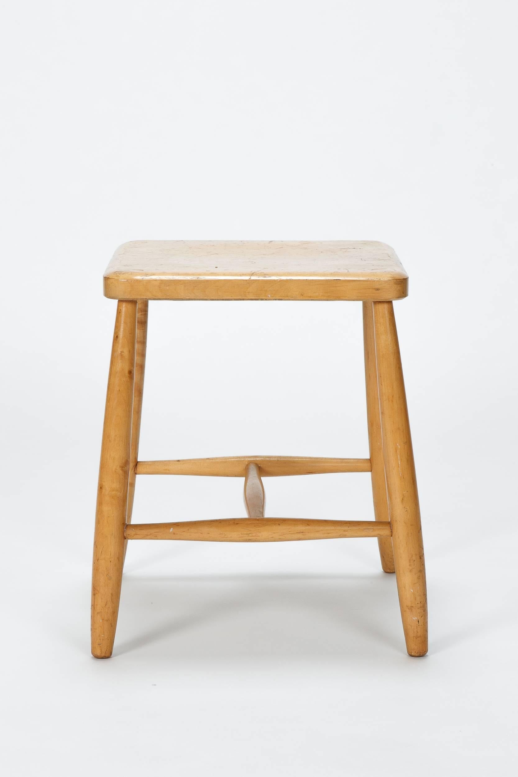 Ilmari Tapiovaara stool for the Swedish manufacturer Hagafors in the 1950s. Completely made of solid birch wood in a very durable construction. Beautiful vintage patina.