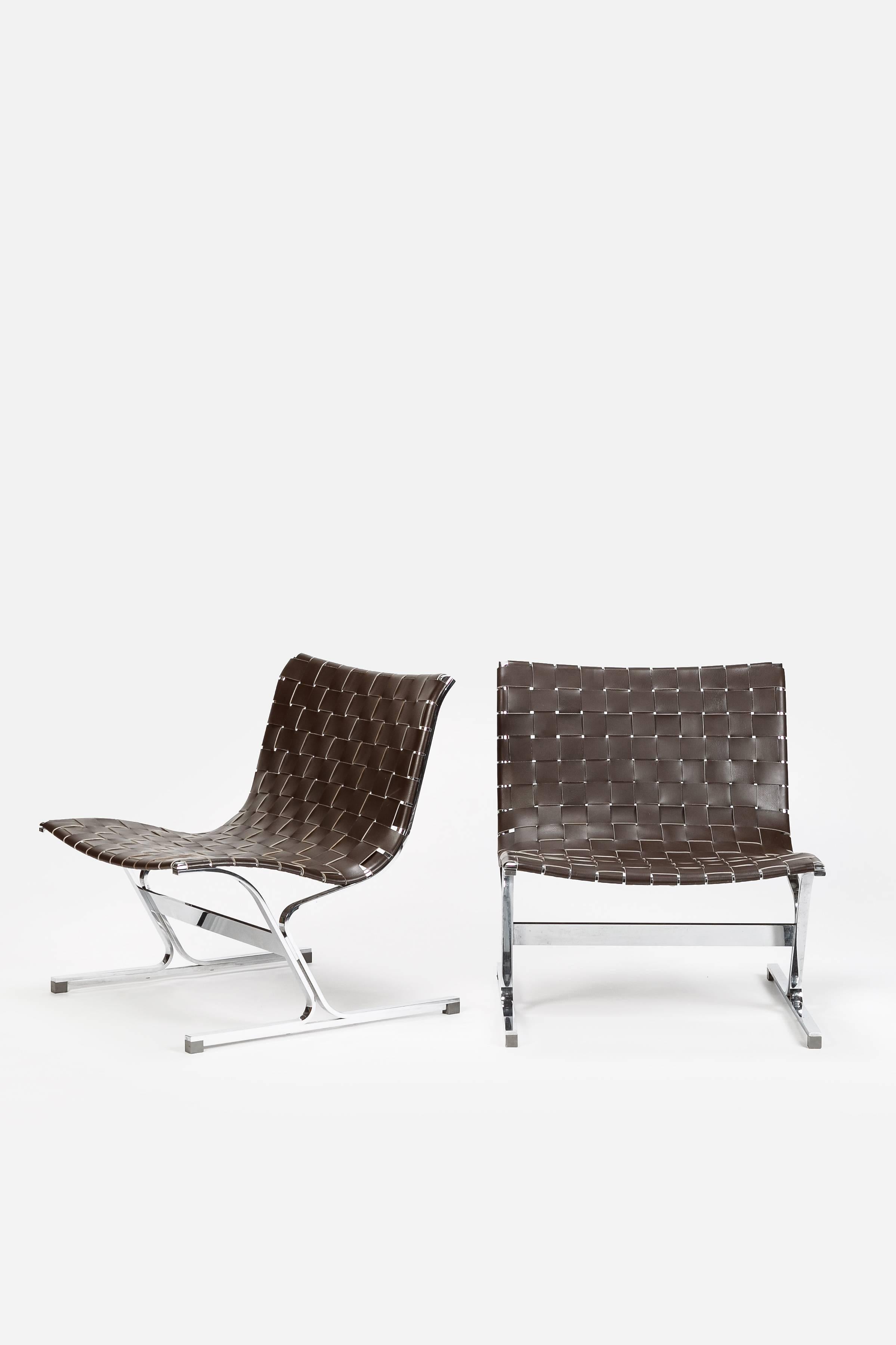 Unique pair of lounge chairs by Ross Littell for ICF, Milano, Italy. New dark brown interwoven saddle leather that is fixed to a steel frame with a chrome finish.