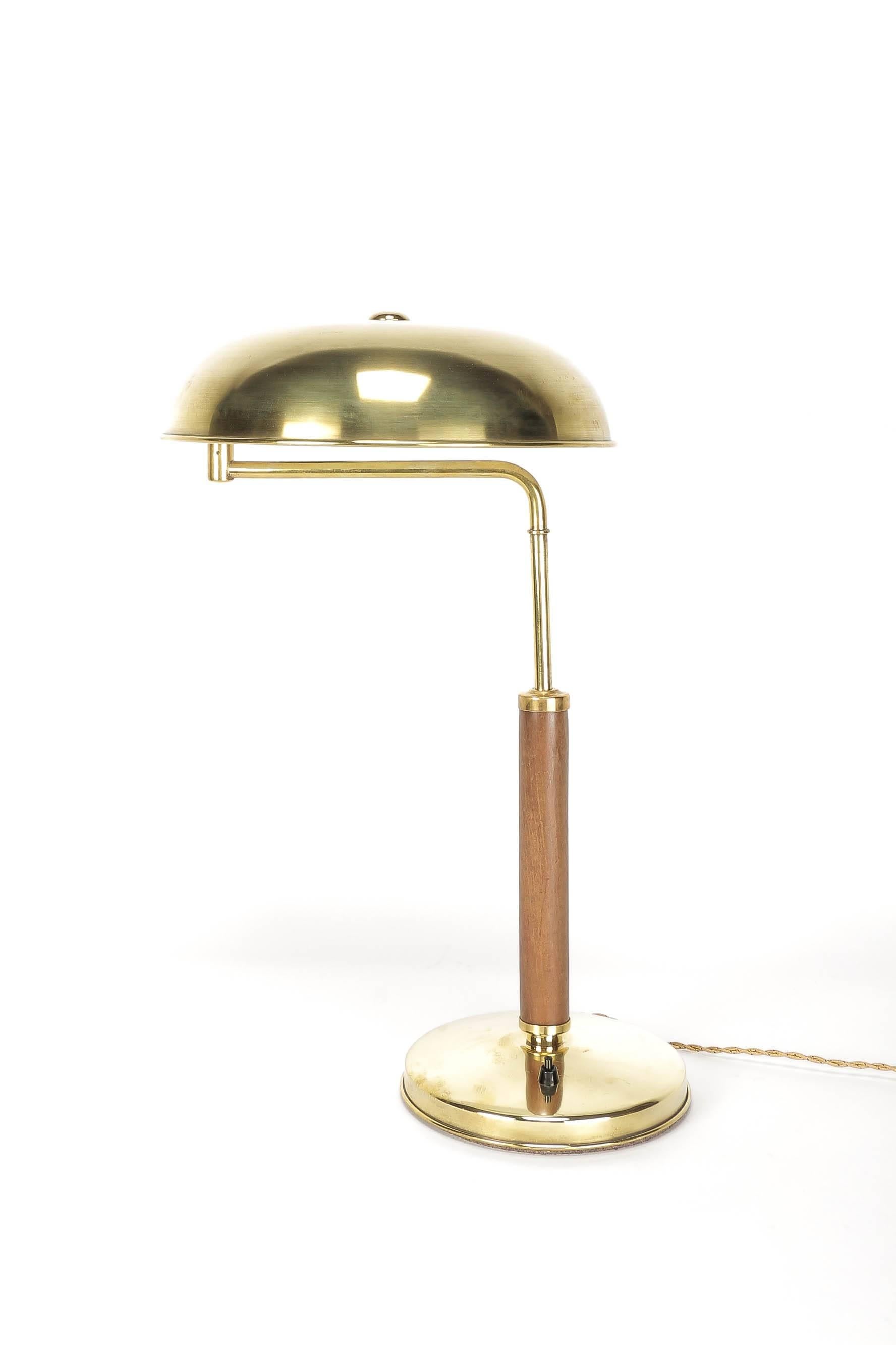 Wonderful desk lamp, model Quick 1500 designed by Alfred Mueller for AMBA, Switzerland in the 1940s. Made of solid brass and oak. Brass was polished, height adjustable with swiveling shade, new wired

Height: 46cm - 58cm!