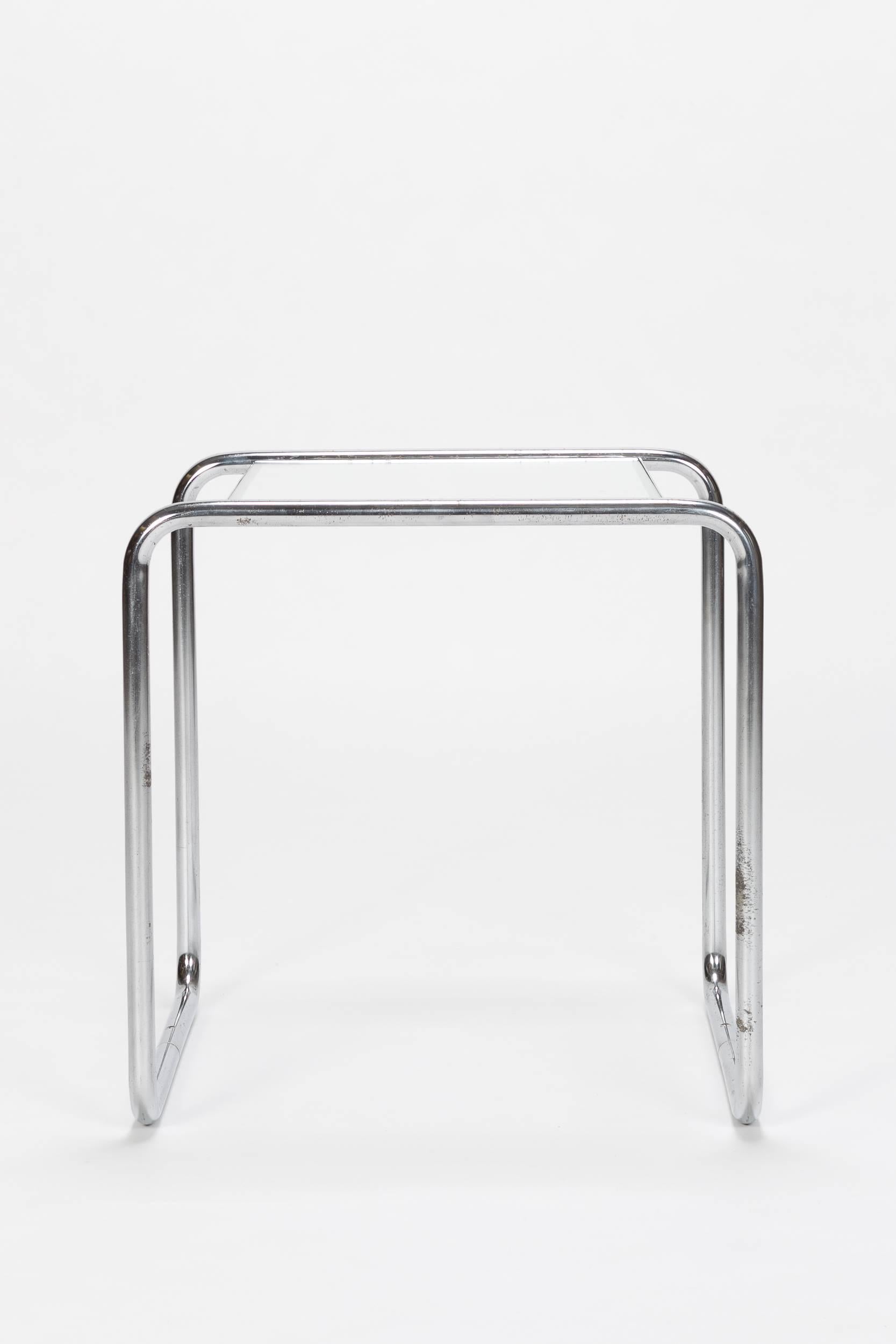 Bauhaus side table custom-made with a tabular steel frame and a glass top, attributed to Marcel Breuer and manufactured in Switzerland in the 1930s.