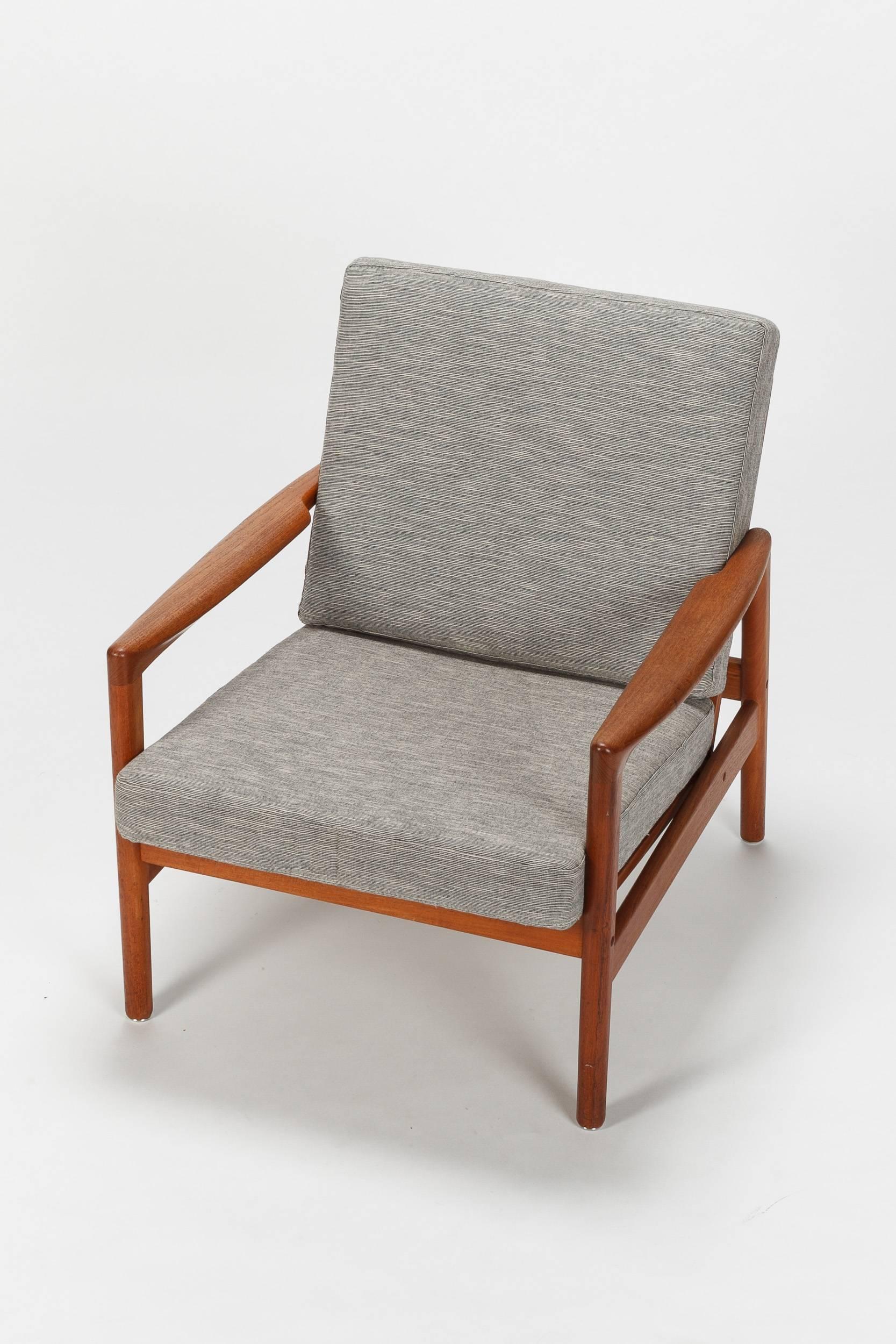 Beautiful pair of Hans Olsen lounge chairs manufactured in the late 1950s by Jaul Kristensen in Denmark. Very elegant shape of frame with beautiful crafted details, made of solid teak in original condition, freshly oil-impregnated. New upholstery,