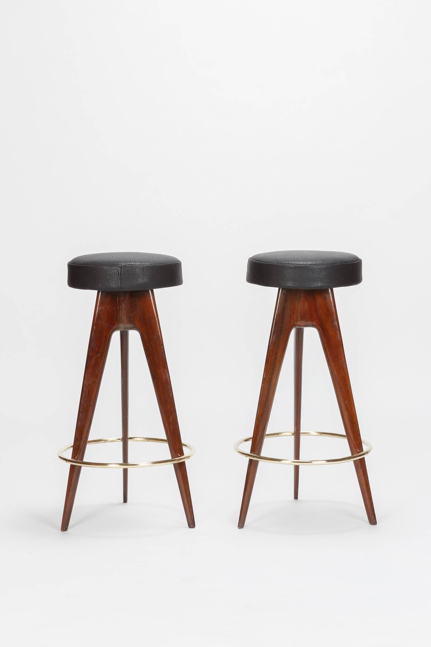 Pair of very rare Italian bar stool manufactured in the 1950s and attributed to Ico Parisi. Tripod base in mahogany, very elegant shape. New cover made of black horse leather (diameter 34.5cm), everything newly polished. Beautiful vintage condition!
