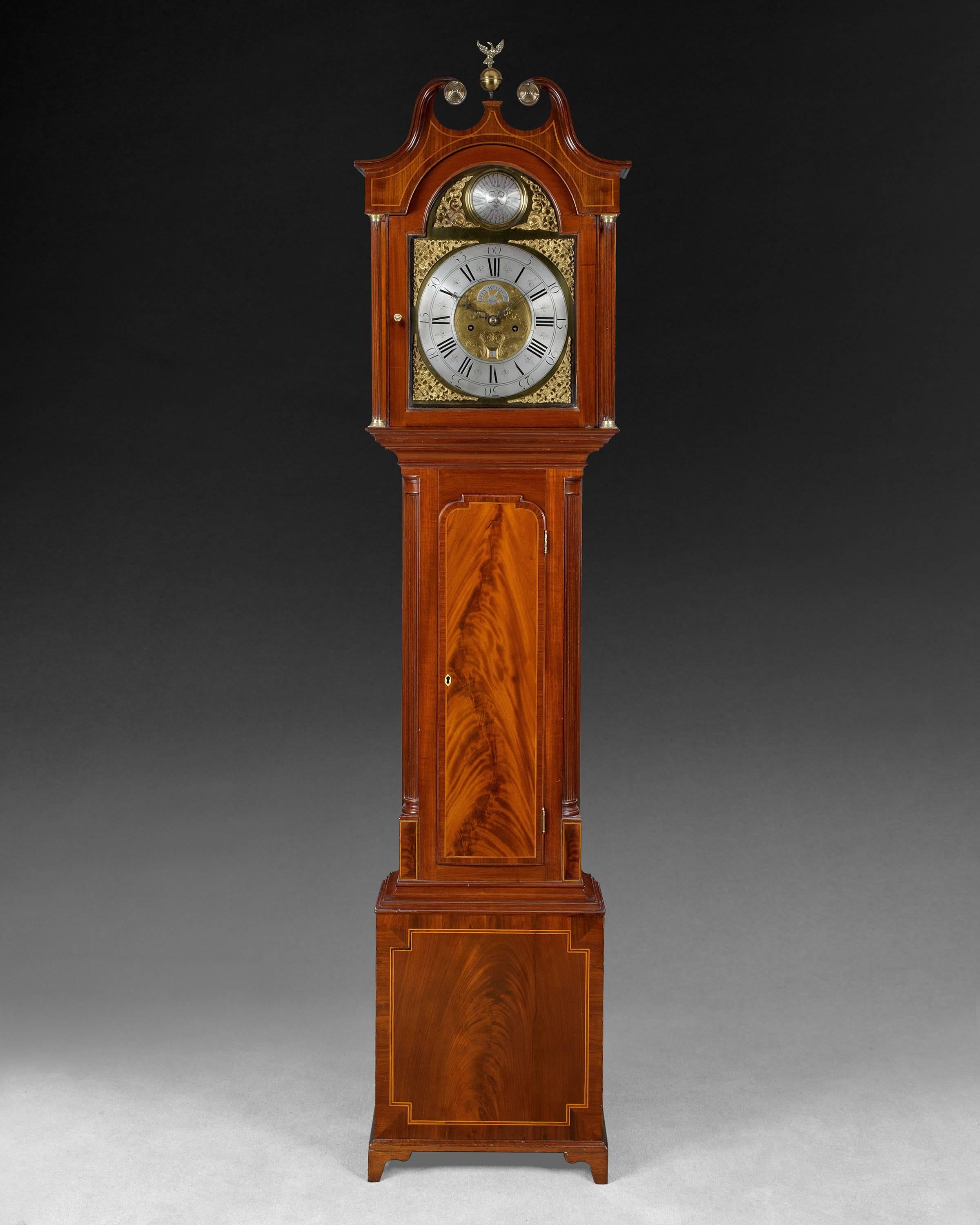 No: 404R “Alexander Wyllie Dumfries” 
A very pleasing and small George III period mahogany and inlaid Scottish longcase clock, the hood with a scrolled pediment centred by a brass eagle finial flanked by brass ringed paterae, the ebony and boxwood