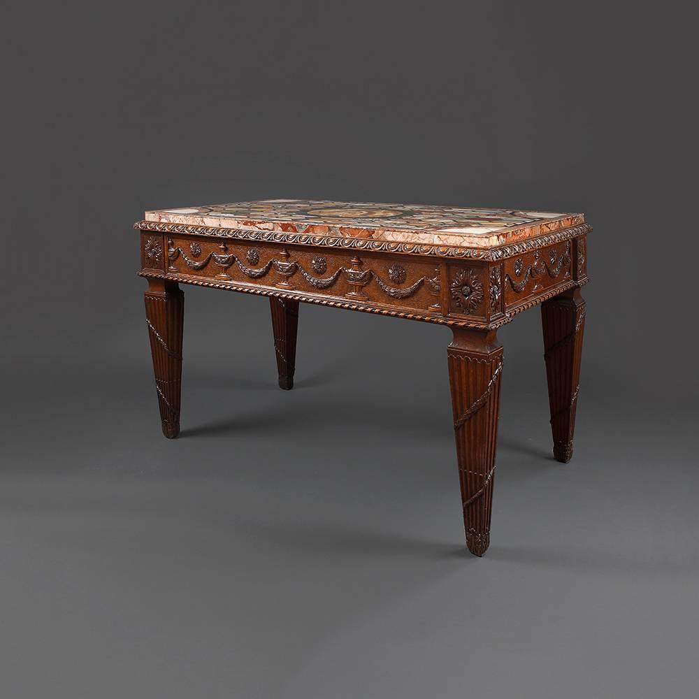 A late 18th century oak console table inset with an mid-18th century rectangular Florentine specimen marble top veneered with precious marbles which came from ancient Roman buildings. 

The base with egg and dart moulding to the lip above a neo