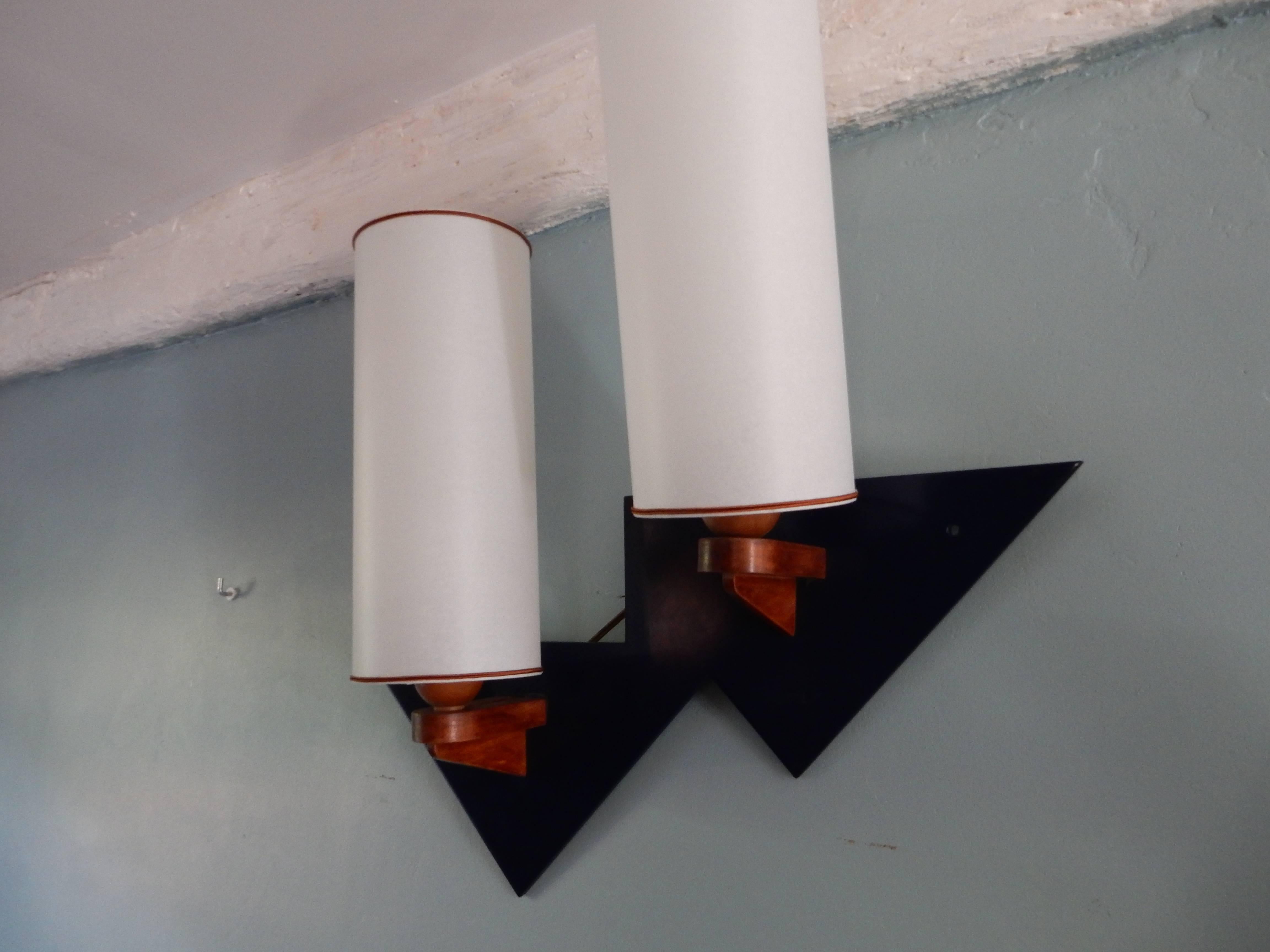 A very interesting modernist sconce by Andre Sornay with a beautiful blue lacquered wood, new white conical lamp-shade.