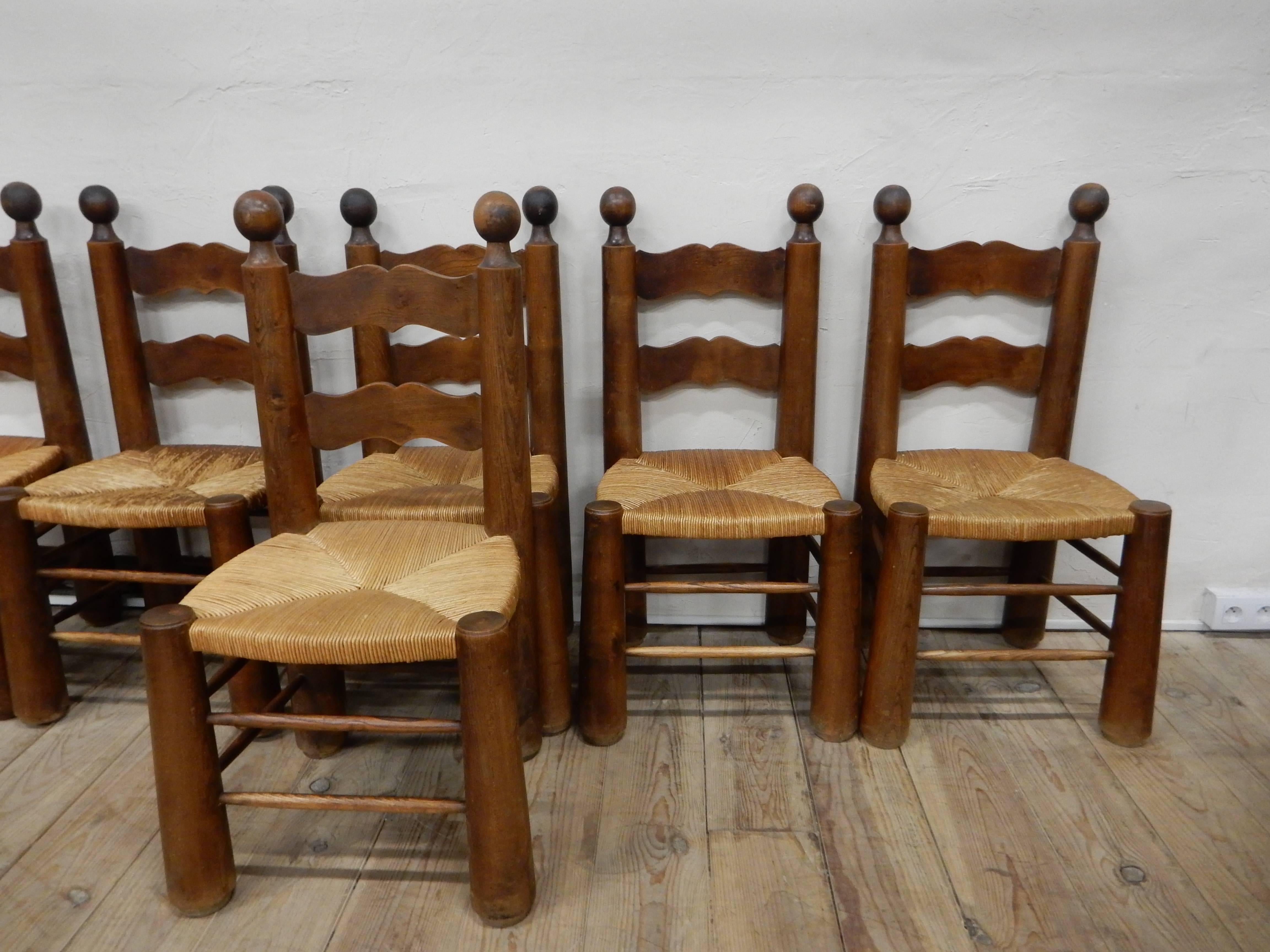 A large set of six country or mountain chairs made of massive wood from 1960.