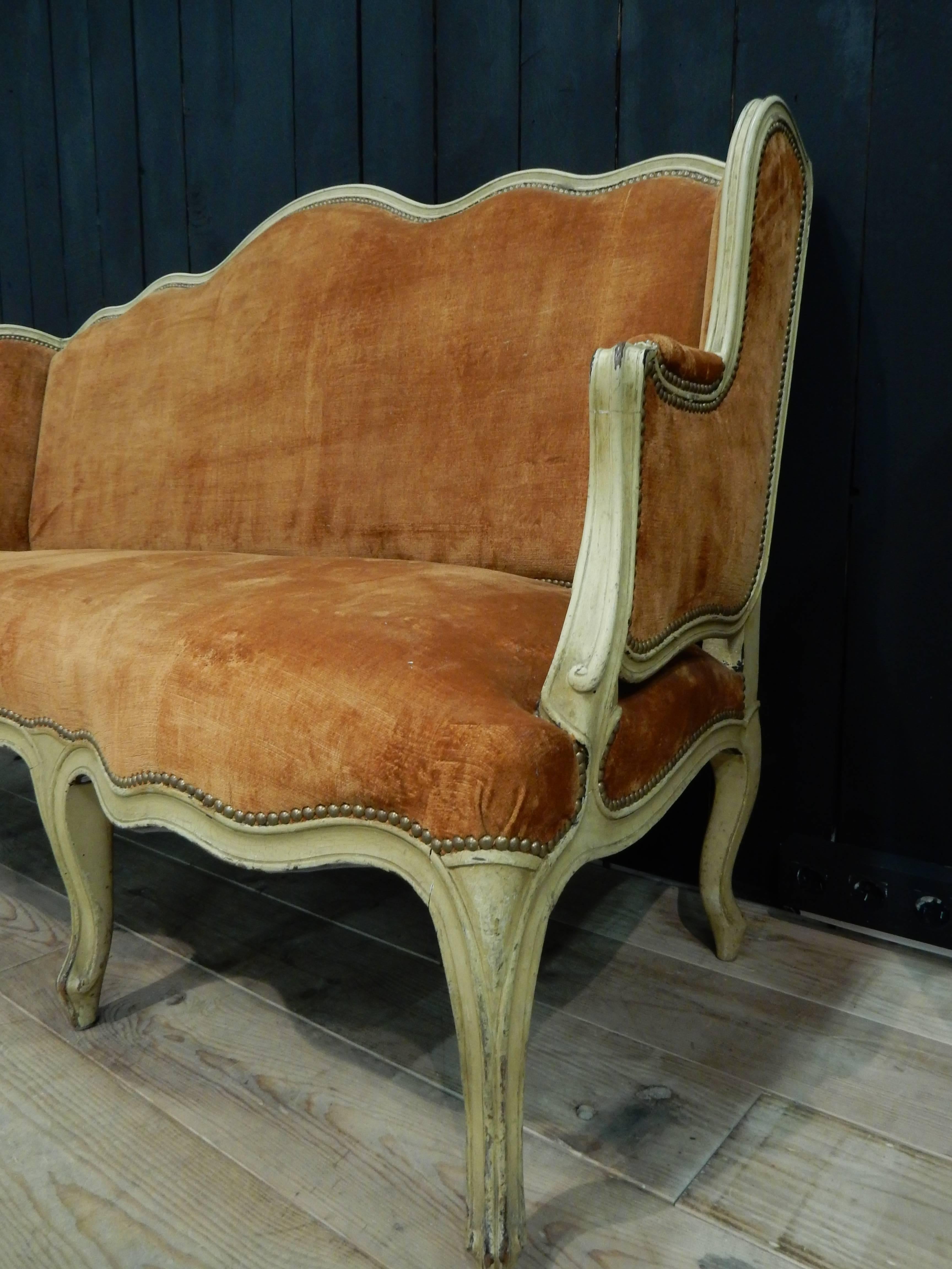 A very chic sofa Louis XV style (1850 period) with a 1960 ré-upholstery attribued by Maison Jansen:splendid velvet coral
all in very good condition, the structure is from 1850 and upholstery from 1960.