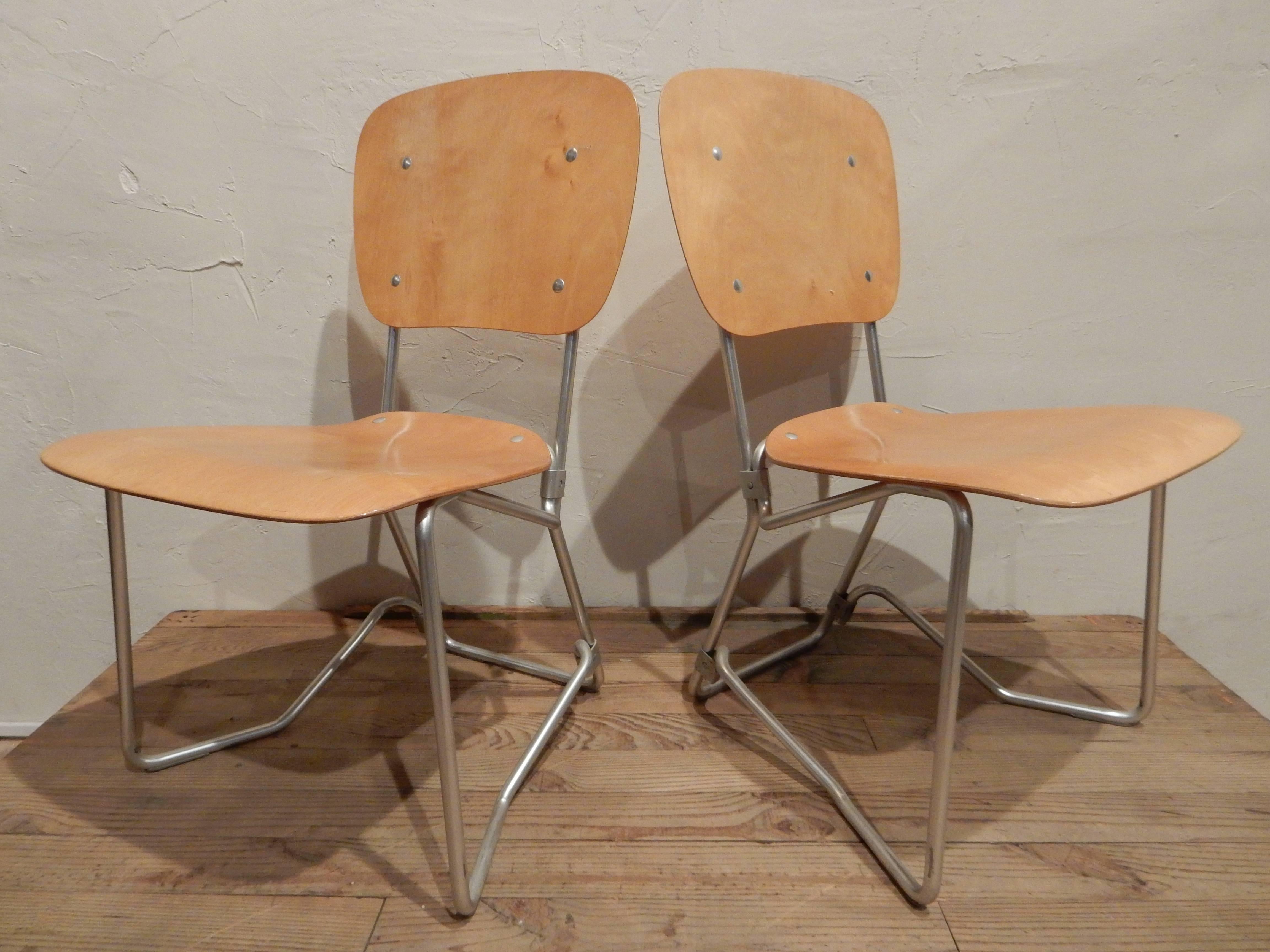 A set of eight original old Armin Wirth chairs very light made of aluminium and beech plywood (can be separated) created in 1951 by PH Zieringe KG 