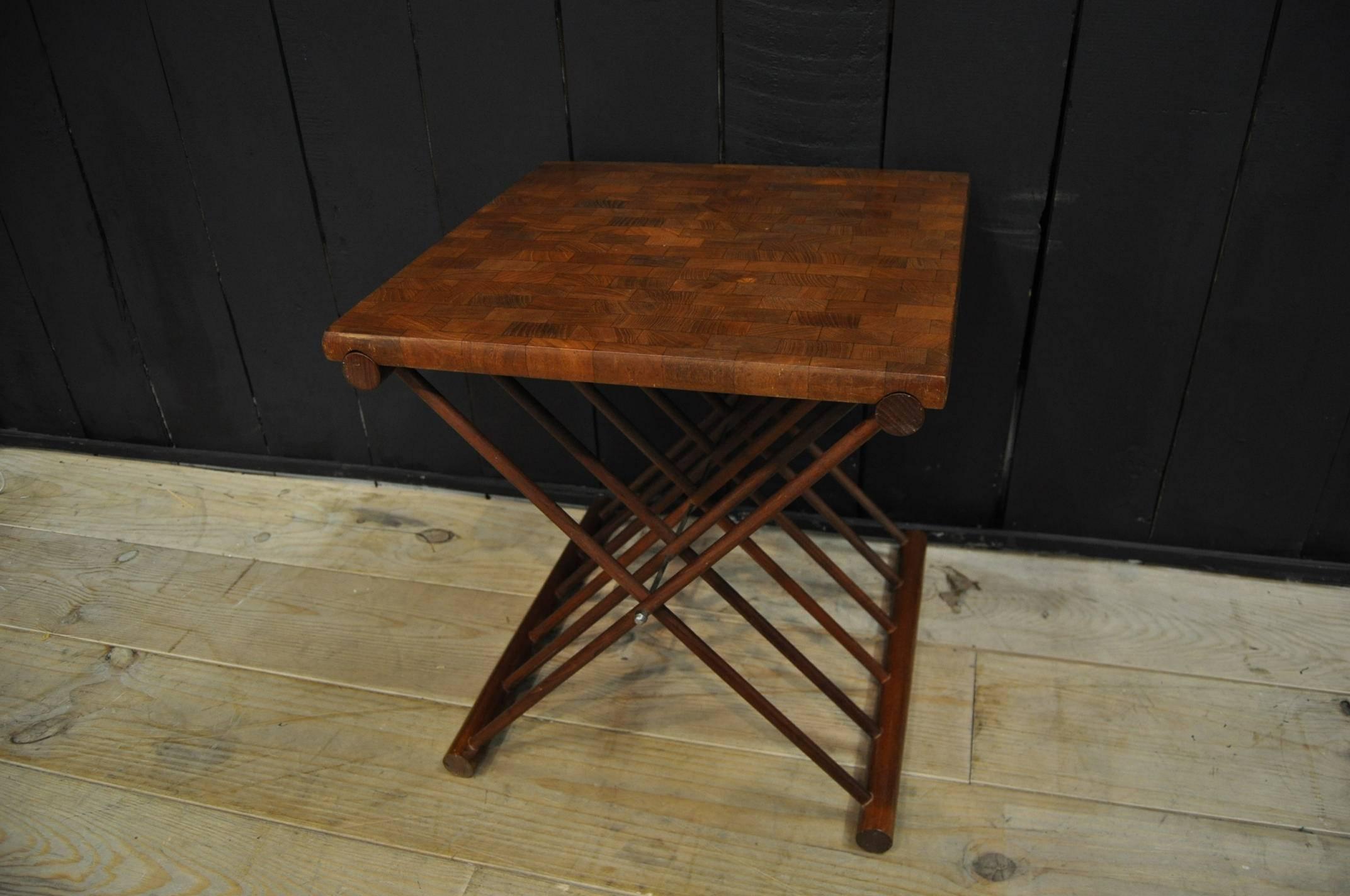 A cute folding table by Jens Quistgaard Bois de bout marquetry (teak) in good condition, circa 1960.