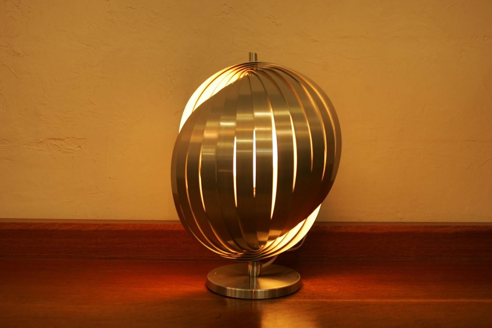 A famous Henri Mathieu spiral lamp: from the collection: Nickelor aluminium created in 1970 with different position (all metal blade move).