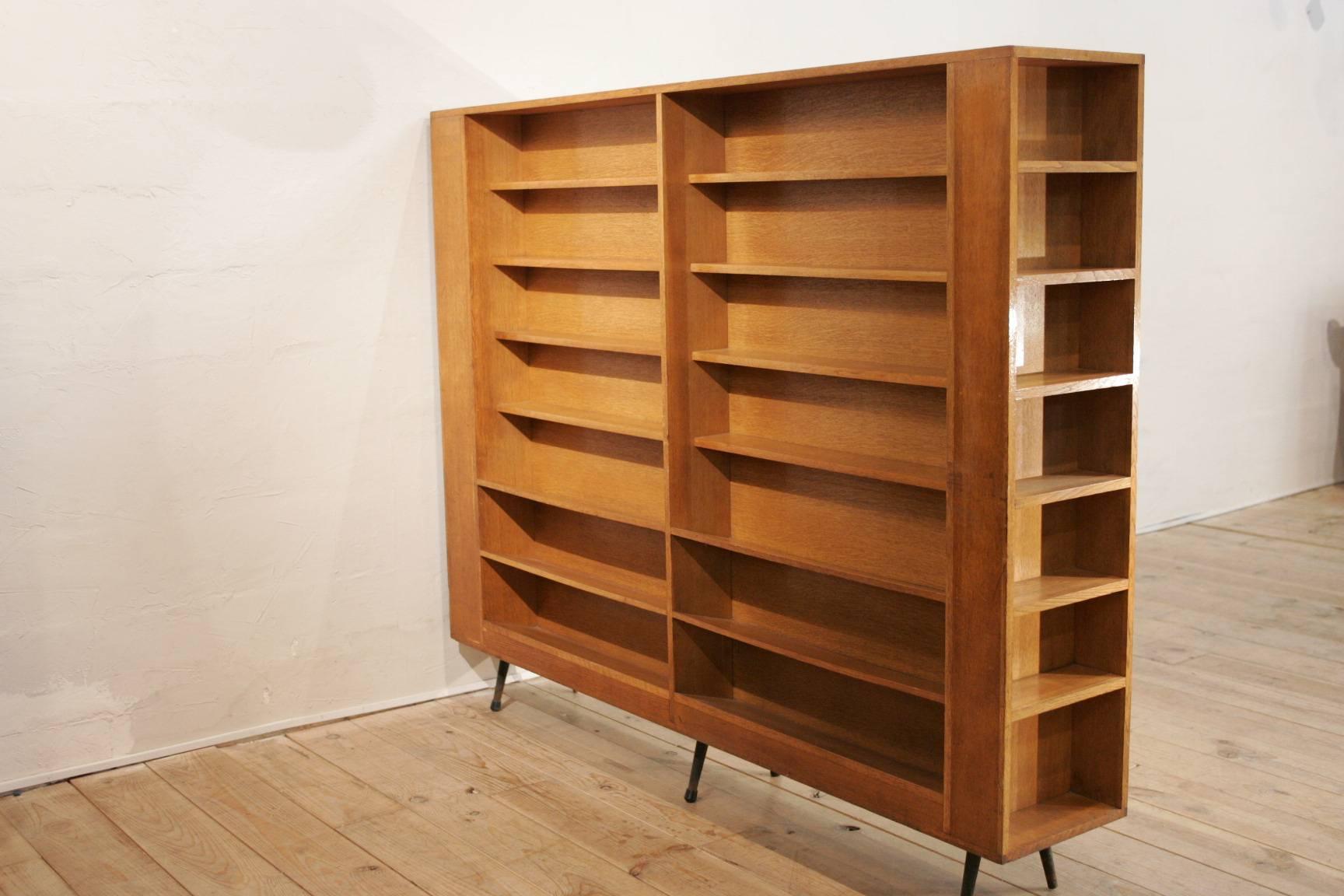 An interesting large book shelve and separation from the 1950s. 